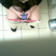 A hidden camera mounted on the ceiling of a Target department store public restroom records a plump girl playing with her cell phone while pissing and shitting into a toilet. Audible plops. She wipes her ass when finished. 720P HD. Over 2 minutes.